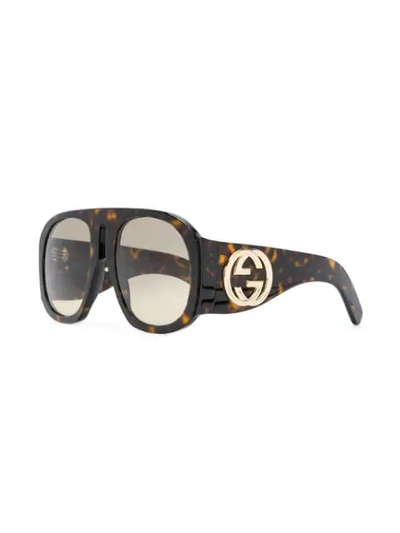 Shop Gucci Round Frame Sunglasses In Brown
