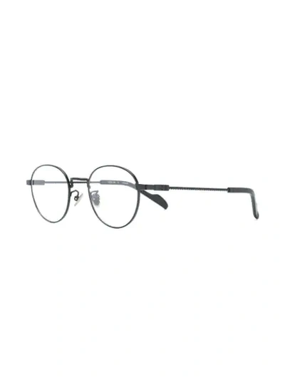 Shop Yohji Yamamoto Round Frame Glasses In Black
