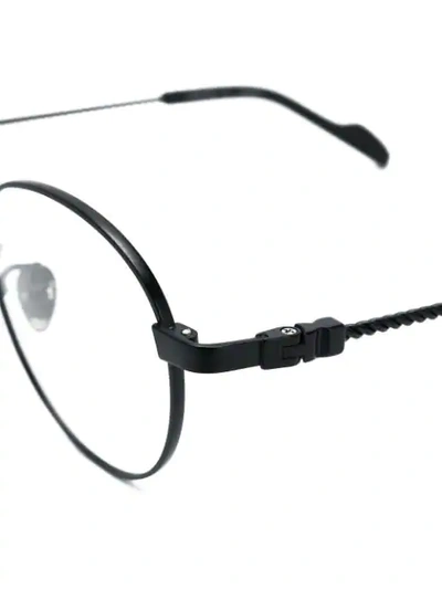 Shop Yohji Yamamoto Round Frame Glasses In Black