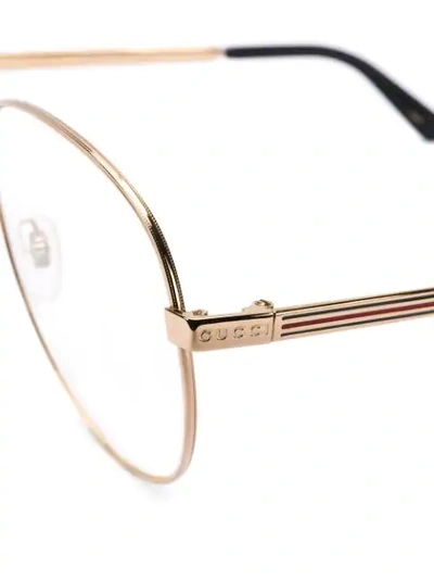 Shop Gucci Aviator Glasses With Web In Metallic