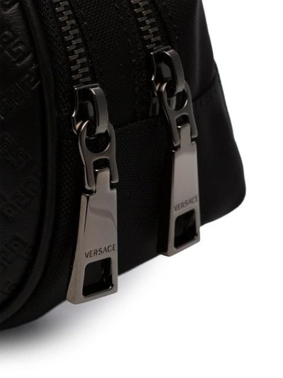 Shop Versace Greek Key Embossed Belt Bag In Black