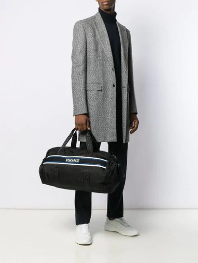 Shop Versace Contrast Logo Holdall In Black