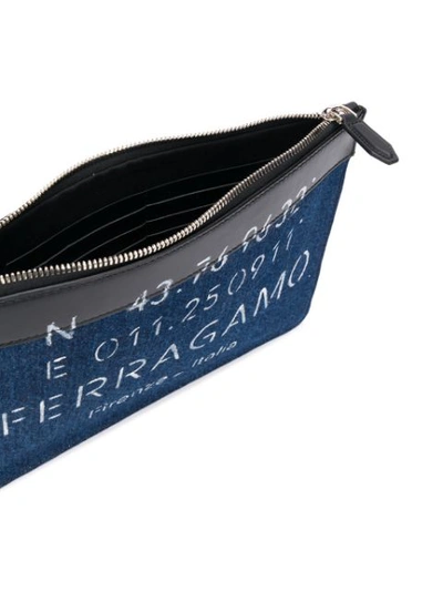 Shop Ferragamo Logo Print Clutch Bag In Blue
