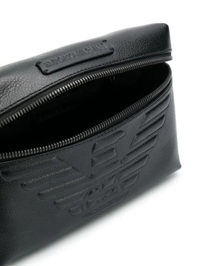 Shop Emporio Armani Logo Embossed Bag In Black