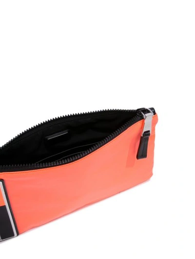 Shop Prada Logo Clutch Bag In Orange