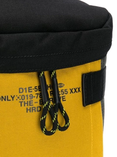 Shop Diesel Drawstring Utility Backpack In Yellow