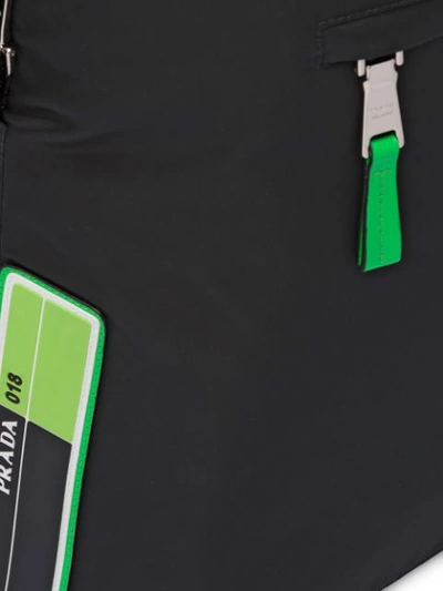 Shop Prada Side Logo Patch Backpack In Black