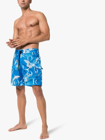 Shop Dior Sorayama And Logo Print Swim Shorts In Blue
