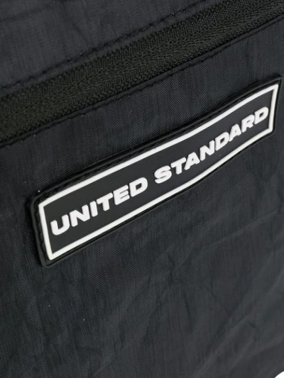 Shop United Standard Logo Patch Messenger Bag In Black