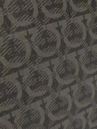 Shop Ferragamo Logo Print Clutch Bag In Black ,grey