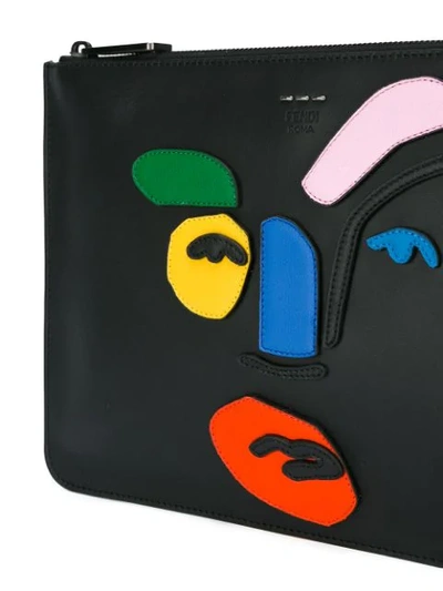 Shop Fendi Abstract Face Clutch In Black