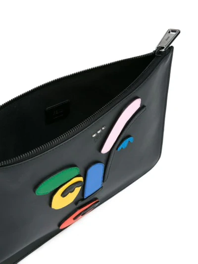 Shop Fendi Abstract Face Clutch In Black