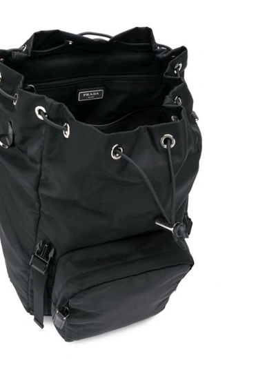 Shop Prada Buckled Backpack In Black