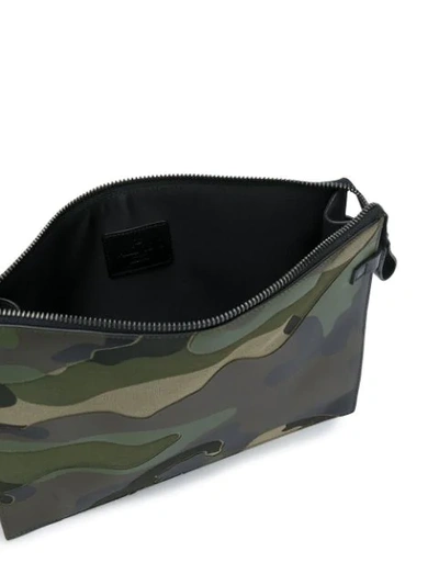 Shop Valentino Garavani Camouflage Clutch In Green