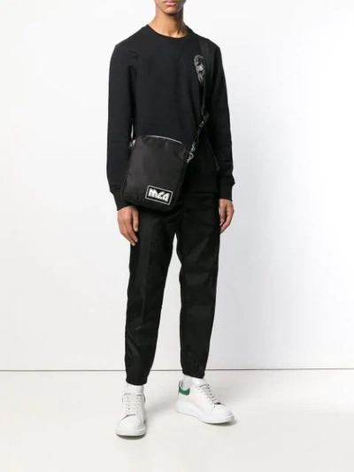 Shop Mcq By Alexander Mcqueen Logo Messenger Bag In Black