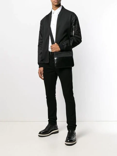 Shop Philipp Plein Embossed Logo Shoulder Bag In Black