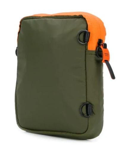 Shop Diesel Compact Messenger Bag In Green