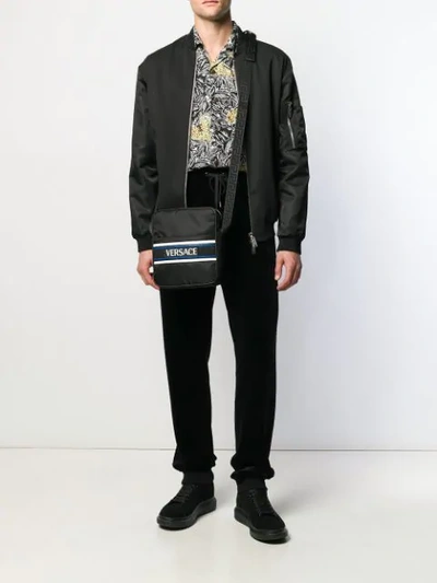 Shop Versace Schultertasche Mit Netzeinsatz In Black