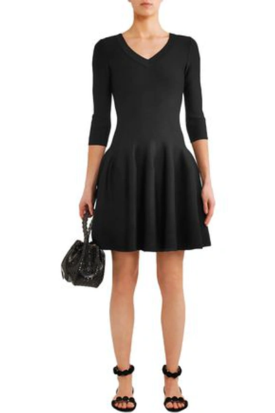 Shop Alaïa Flared Textured Stretch-knit Mini Dress In Black
