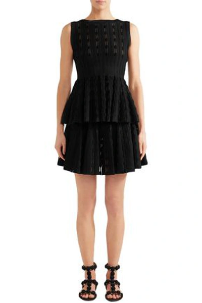 Shop Alaïa Pleated Stretch-knit Mini Skirt In Black