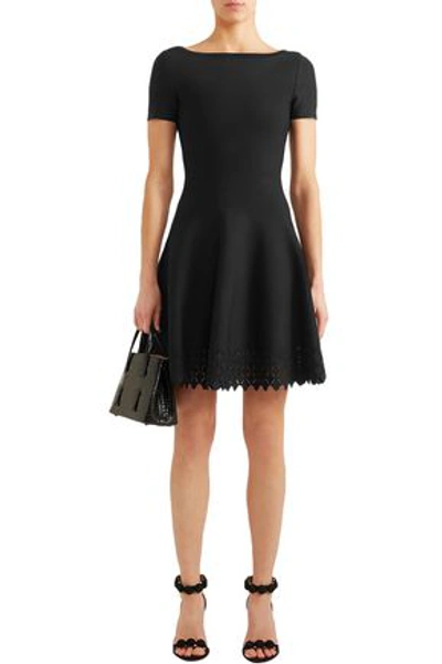 Shop Alaïa Laser-cut Knitted Mini Dress In Black