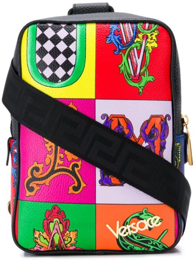 Shop Versace Alphabet Print Backpack In 红色