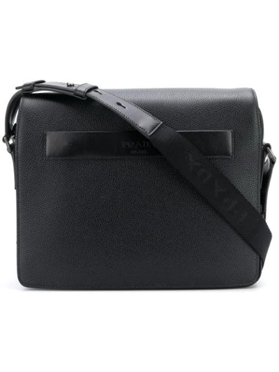 Shop Prada Pebbled Messenger Bag In Black