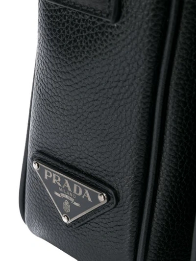 Shop Prada Pebbled Messenger Bag In Black