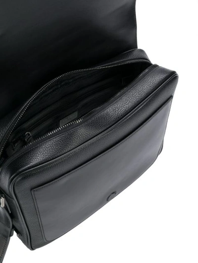 Shop Prada Pebbled Messenger Bag In Black