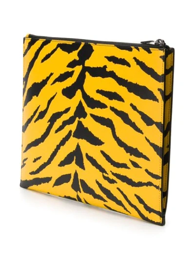 Shop Saint Laurent Zebra Print Clutch In Yellow