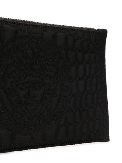 Shop Versace Embossed Medusa Pouch In Black