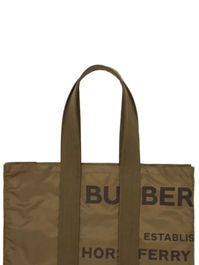 Shop Burberry Belt Detail Horseferry Print Nylon Tote In Green