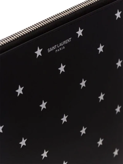 Shop Saint Laurent Star-embossed Pouch Bag In Black