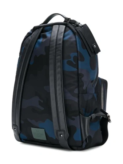 Shop Valentino Garavani Rockstud Camouflage Print Backpack - Blue
