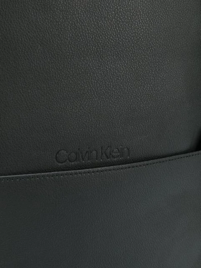 Shop Calvin Klein Round Faux-leather Backpack In Black