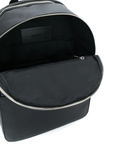 Shop Calvin Klein Round Faux-leather Backpack In Black