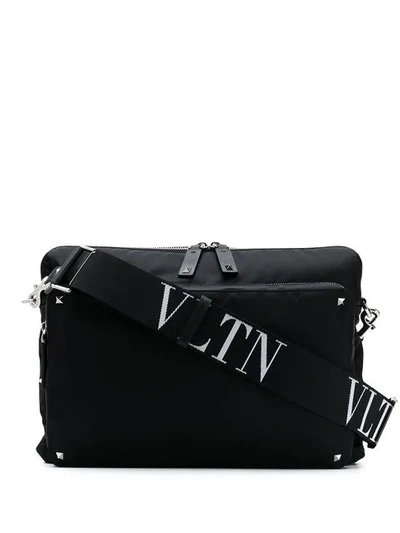 Shop Valentino Garavani Rockstud Logo Messenger Bag In Black