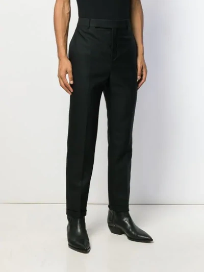 Shop Saint Laurent Roll-up Hem Tailored Trousers In Black