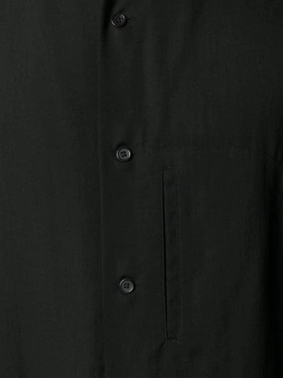 Shop Yohji Yamamoto Buckled Collar Longline Shirt In Black