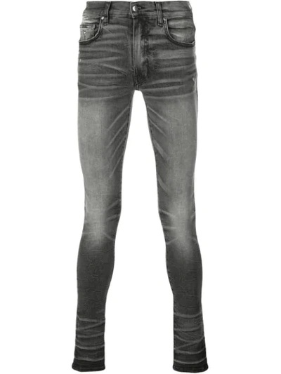 Shop Amiri Stack Skinny Jeans In Vintage Grey