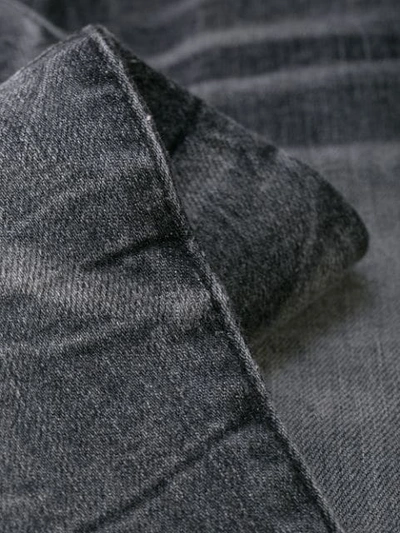 Shop Amiri Stack Skinny Jeans In Vintage Grey