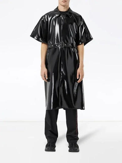 Shop Burberry Vinyl Belted Cape In Black