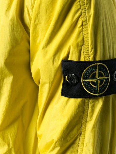 Shop Stone Island Logo Bomber Jacket In Yellow