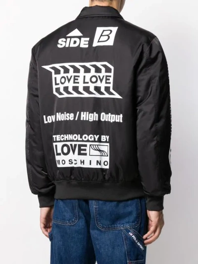 Shop Love Moschino Printed Bomber Jacket In Black