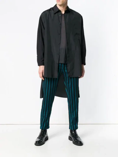 Shop Ann Demeulemeester Striped Trousers - Blue