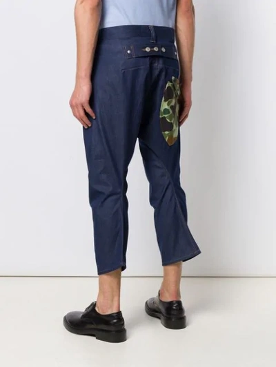 Shop Junya Watanabe Cropped Camouflage Jeans In Blue