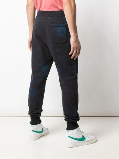 Shop John Elliott Double Dye Track Pants In Blue