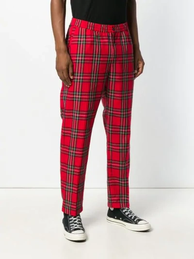 Shop Stussy Check Tapered Trousers In Red