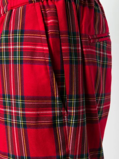Shop Stussy Check Tapered Trousers In Red
