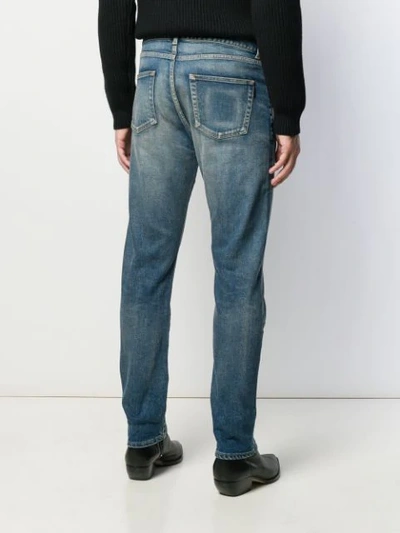 Shop Saint Laurent Slim-fit Stonewashed Jeans In Blue